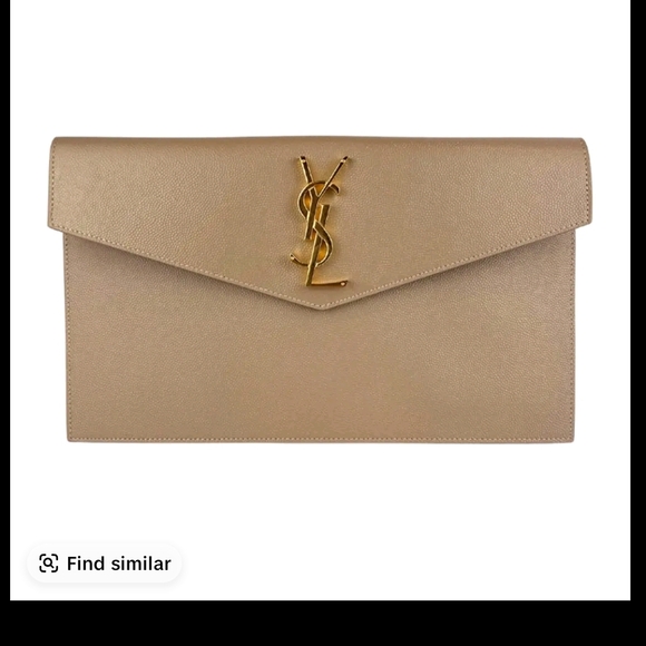 Yves Saint Laurent Handbags - Yves Saint Laurent Beige Clutch with Gold Logo